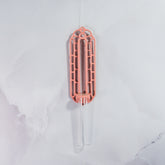 "Front view of empty CLAY RED Wall Propagation unit, showcasing a single clear tube mounted on a vibrant clay red base."